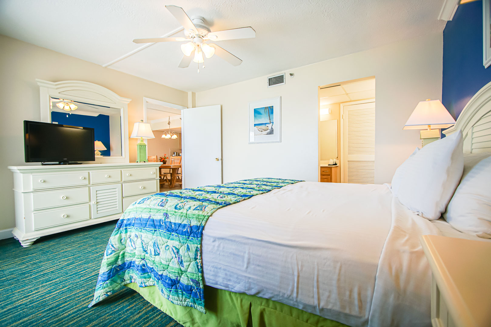 An airy master bedroom at VRI's Landmark Holiday Beach Resort in Panama City, Florida.